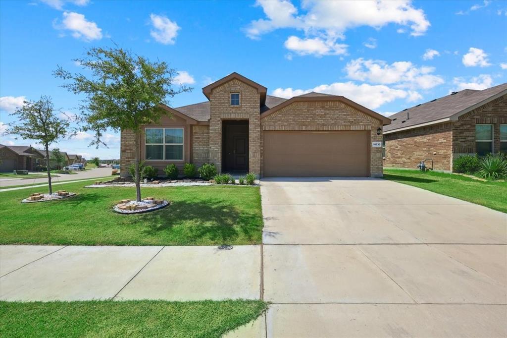 16733 Portage Street Justin, TX 76247 - Photo 2 of 39 a front view of house with yard