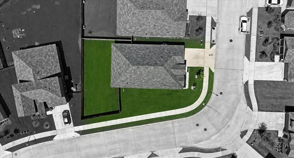 16733 Portage Street Justin, TX 76247 - Photo 3 of 39 a bird view of a fireplace with black and white walls