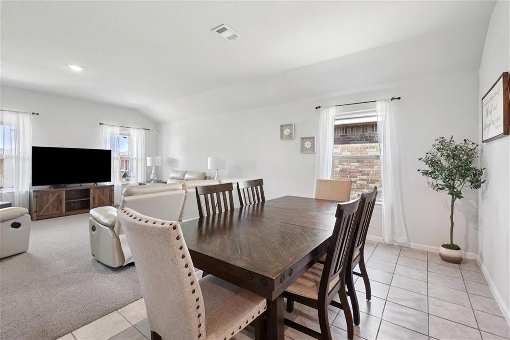 16733 Portage Street Justin, TX 76247 - Photo 32 of 39 a view of a dining room with furniture