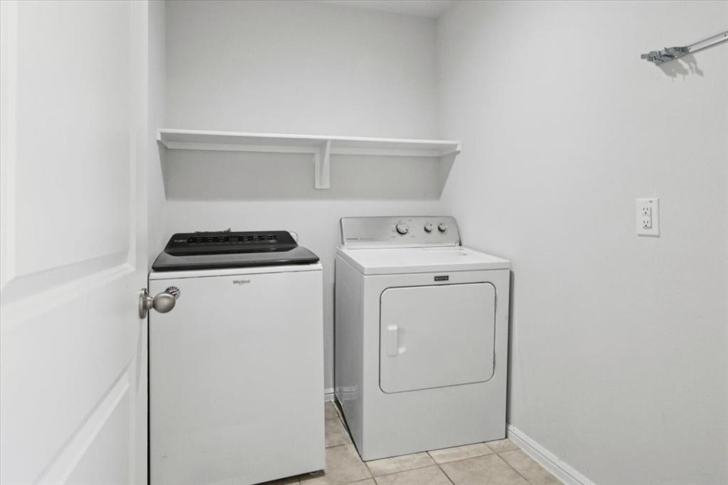 16733 Portage Street Justin, TX 76247 - Photo 36 of 39 a utility room with dryer and washer