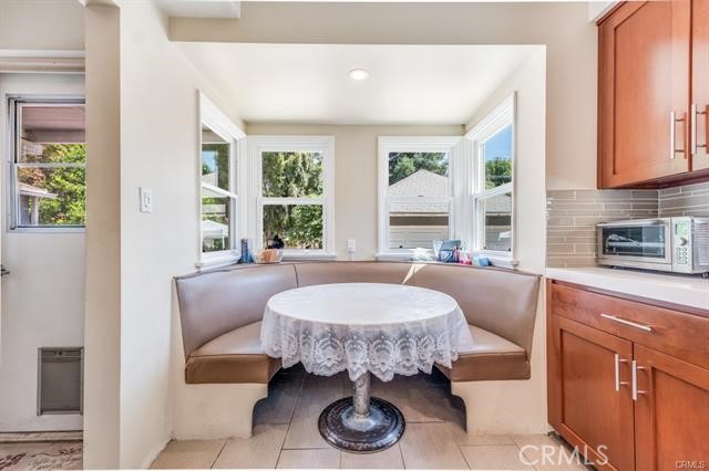 5646-5646 Vesper Avenue Sherman Oaks, CA 91411 - Photo 12 of 17 a living room with furniture and a large window