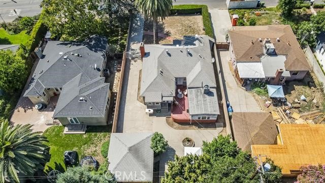 5646-5646 Vesper Avenue Sherman Oaks, CA 91411 - Photo 17 of 17 an aerial view of residential houses with outdoor space
