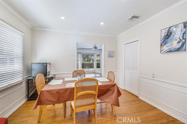 5646-5646 Vesper Avenue Sherman Oaks, CA 91411 - Photo 8 of 17 a view of a dining room with furniture and wooden floor