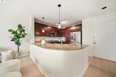a kitchen with sink cabinets and window