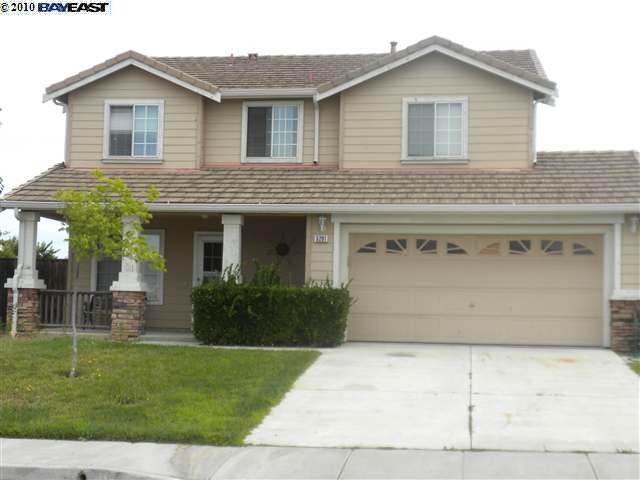5201 Cedar Ridge Way Antioch, CA 94531 - Photo 1 of 1 a front view of a house with a yard