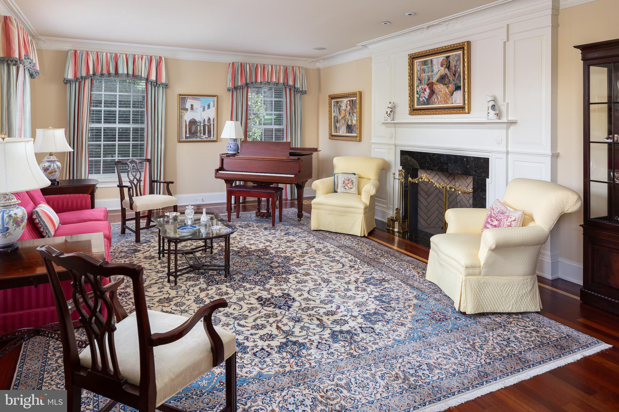 152 Grubb Road Malvern, PA 19355 - Photo 14 of 74 a living room with furniture a rug a fireplace and a window