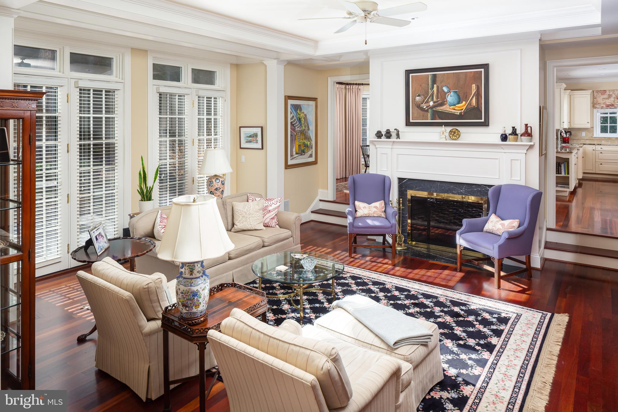 152 Grubb Road Malvern, PA 19355 - Photo 32 of 74 a living room with furniture a fireplace and a table