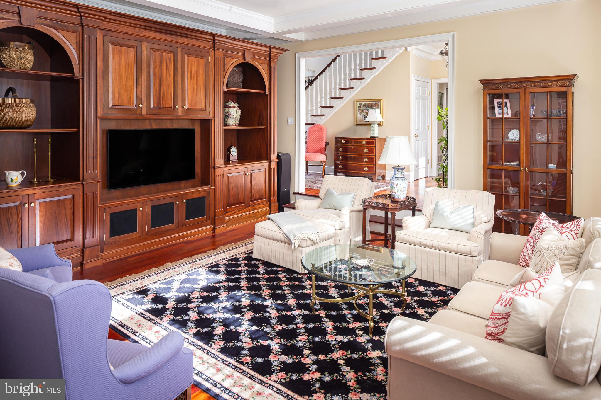 152 Grubb Road Malvern, PA 19355 - Photo 33 of 74 a living room with furniture a flat screen tv and a fireplace
