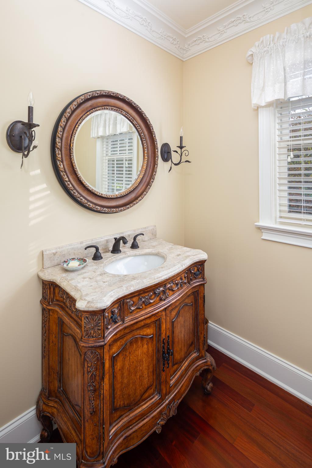 152 Grubb Road Malvern, PA 19355 - Photo 36 of 74 a utility room with a sink a stove and a mirror