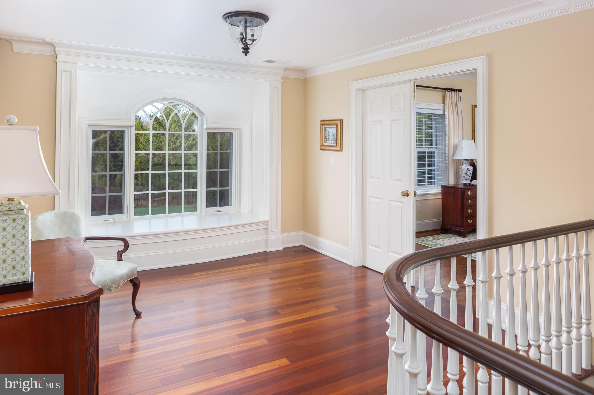 152 Grubb Road Malvern, PA 19355 - Photo 40 of 74 a view of an empty room with wooden floor and a window