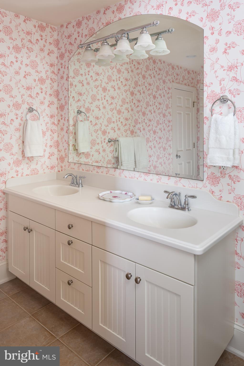 152 Grubb Road Malvern, PA 19355 - Photo 50 of 74 a bathroom with a sink and a mirror