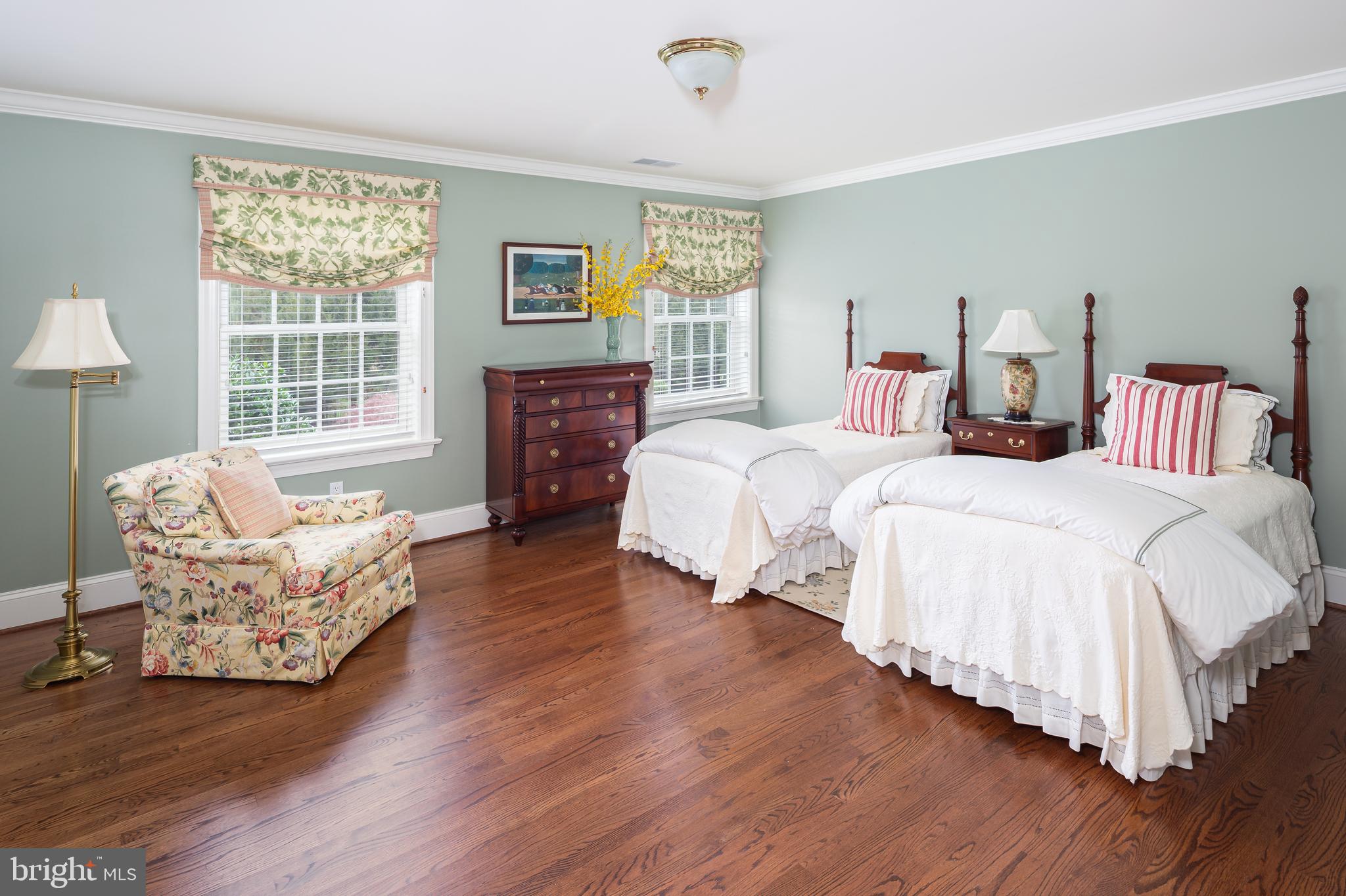 152 Grubb Road Malvern, PA 19355 - Photo 53 of 74 a spacious bedroom with two beds and a couch