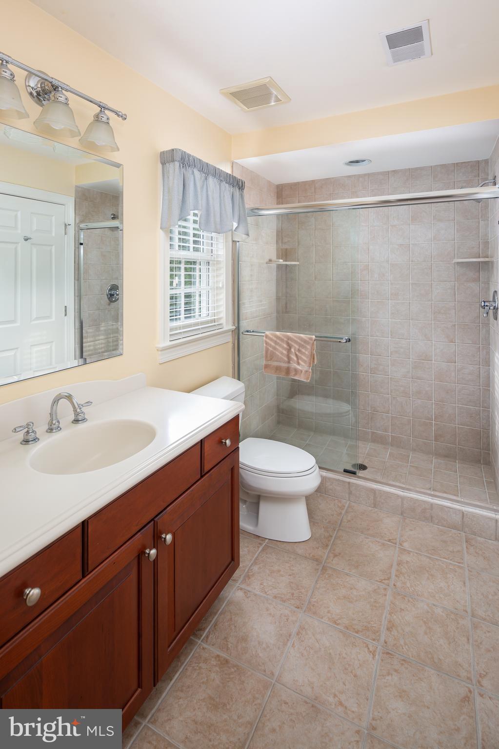 152 Grubb Road Malvern, PA 19355 - Photo 61 of 74 a bathroom with a double vanity sink toilet and shower