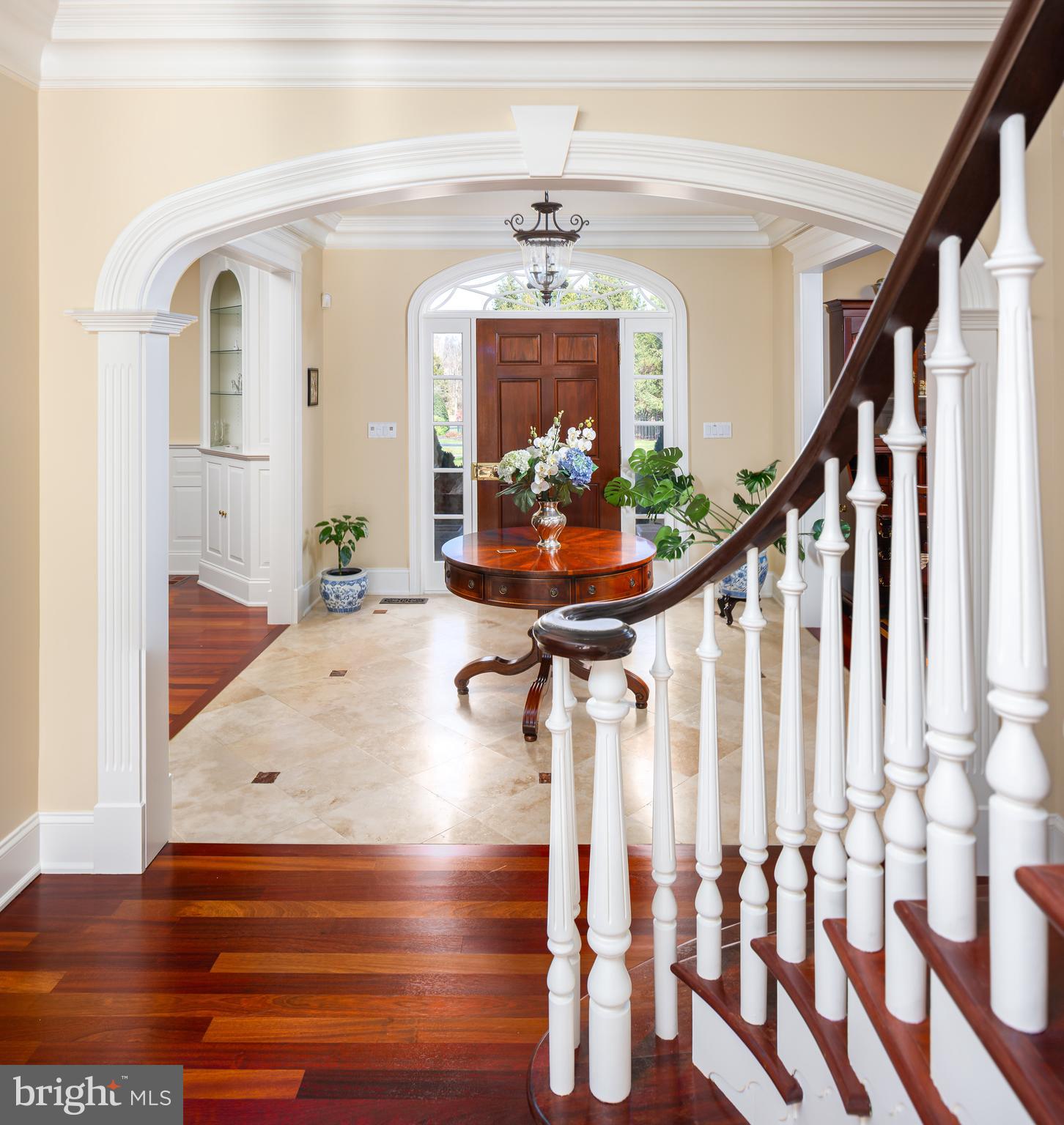152 Grubb Road Malvern, PA 19355 - Photo 7 of 74 a view of a hallway with wooden floor and staircase