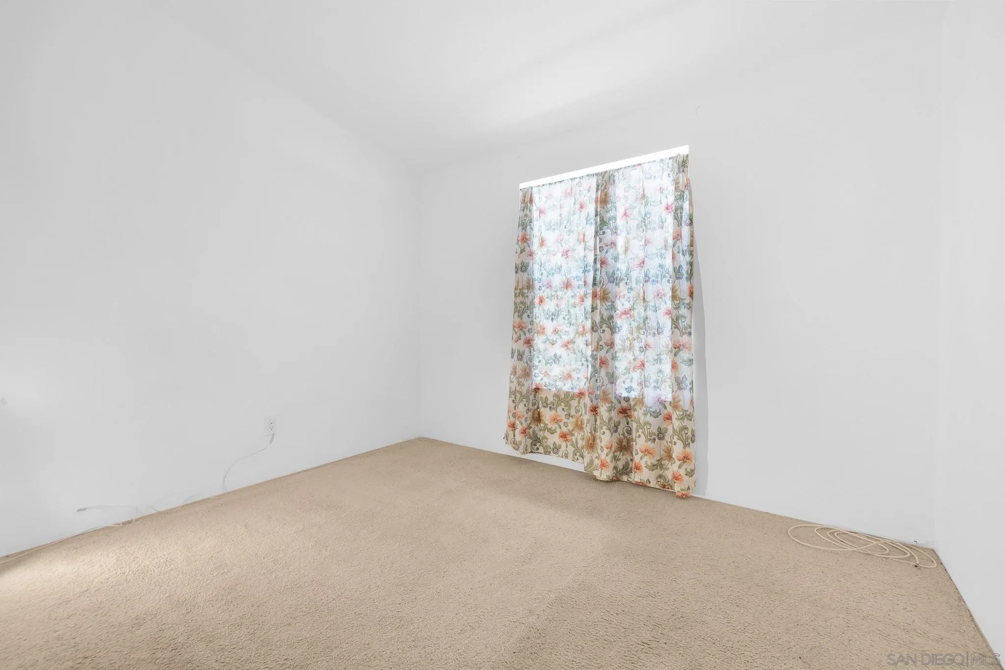 10880 Highway 67, Unit 74 Lakeside, CA 92040 - Photo 5 of 18 an empty room with windows