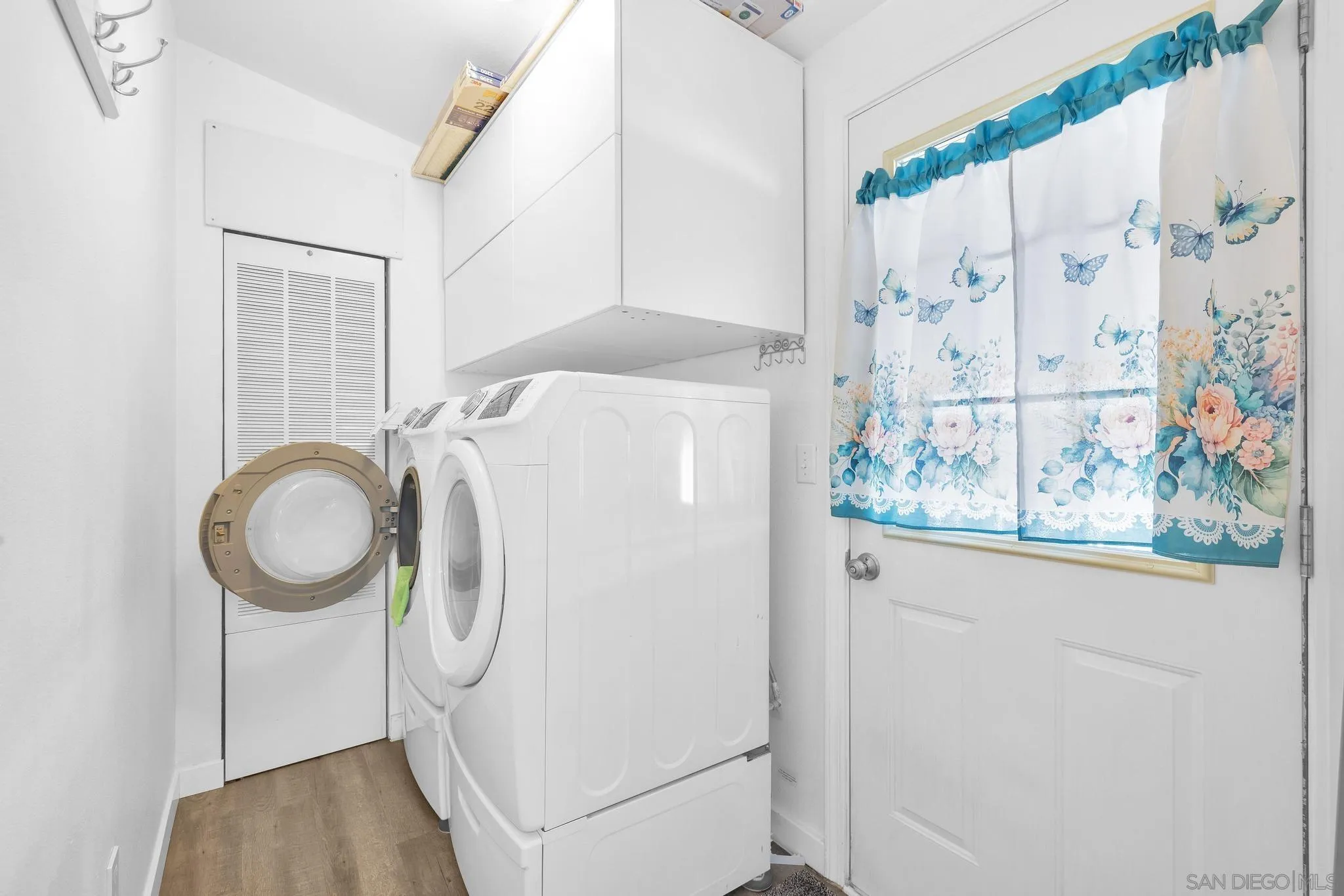 10880 Highway 67, Unit 74 Lakeside, CA 92040 - Photo 10 of 18 a utility room with dryer and washer
