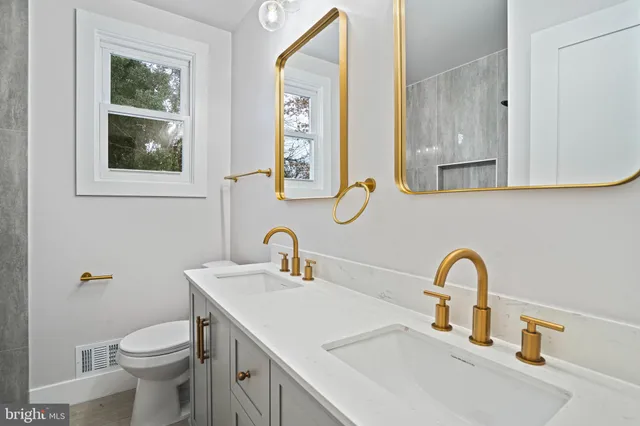 a bathroom with a sink and a toilet