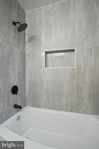 a bathroom with a bathtub