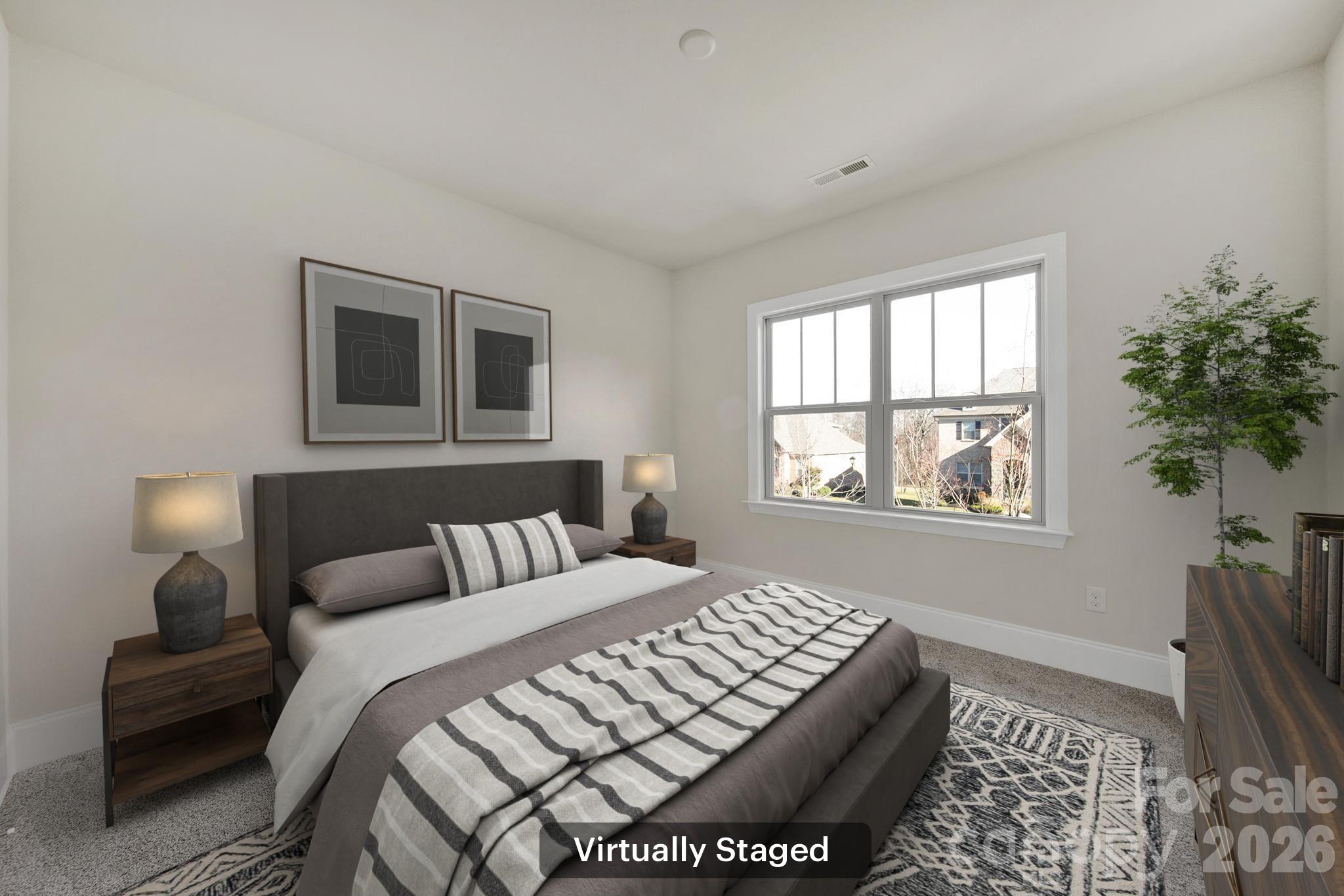 6507 Calvert Commons Drive Huntersville, NC 28078 - Photo 22 of 47 a bedroom with a bed and a window