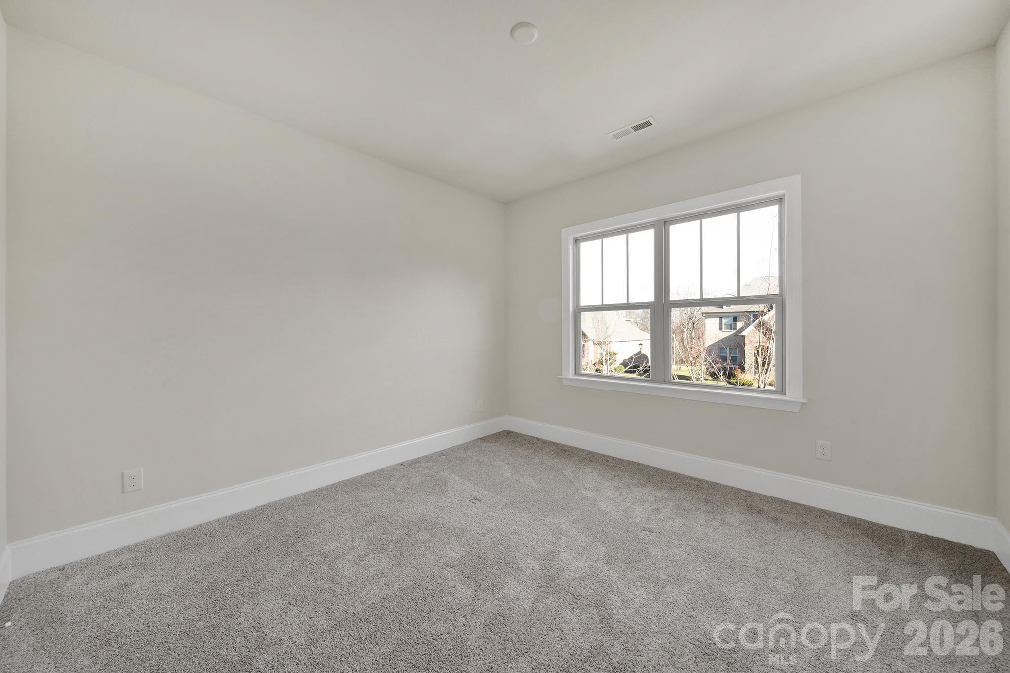 6507 Calvert Commons Drive Huntersville, NC 28078 - Photo 23 of 47 an empty room with windows