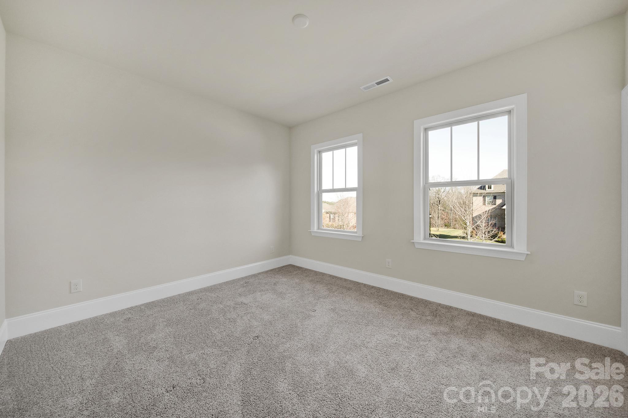 6507 Calvert Commons Drive Huntersville, NC 28078 - Photo 25 of 47 an empty room with windows