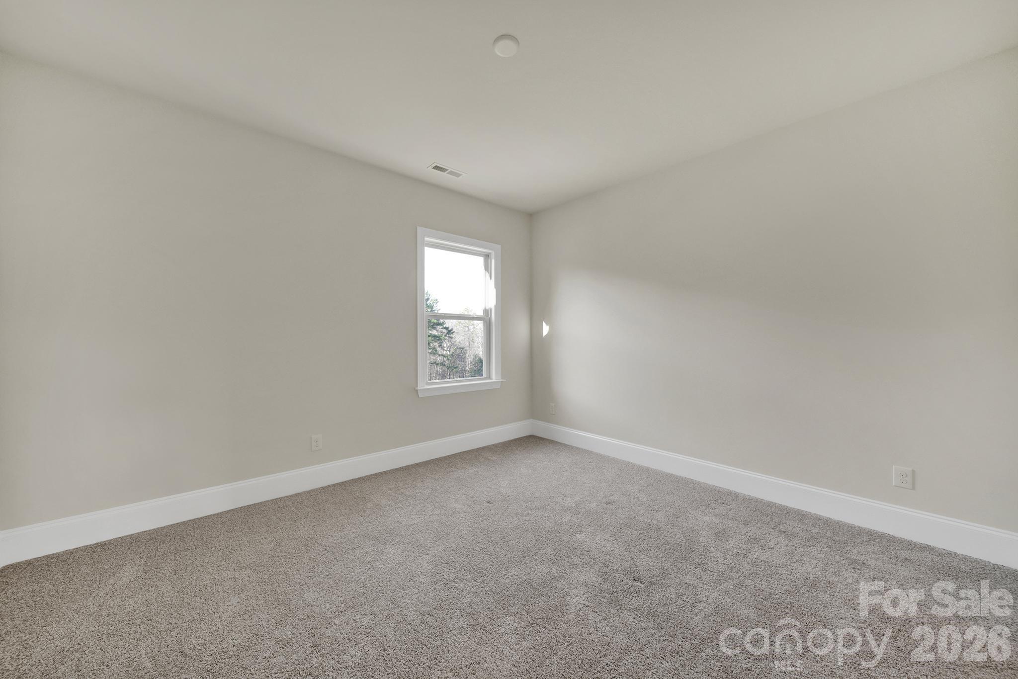 6507 Calvert Commons Drive Huntersville, NC 28078 - Photo 28 of 47 an empty room with windows