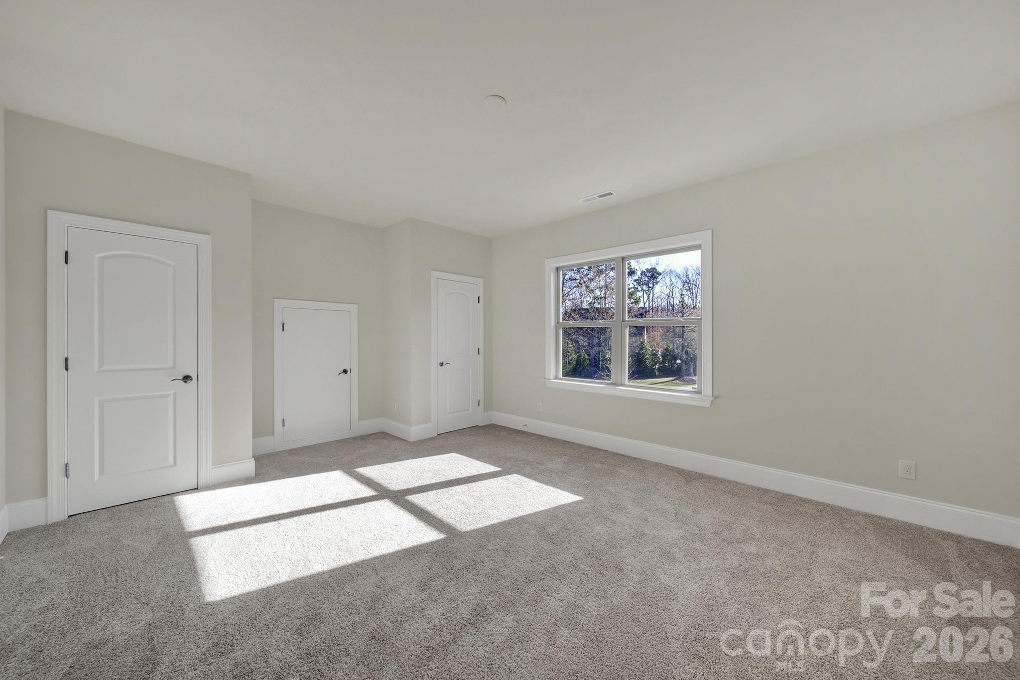 6507 Calvert Commons Drive Huntersville, NC 28078 - Photo 29 of 47 an empty room with windows