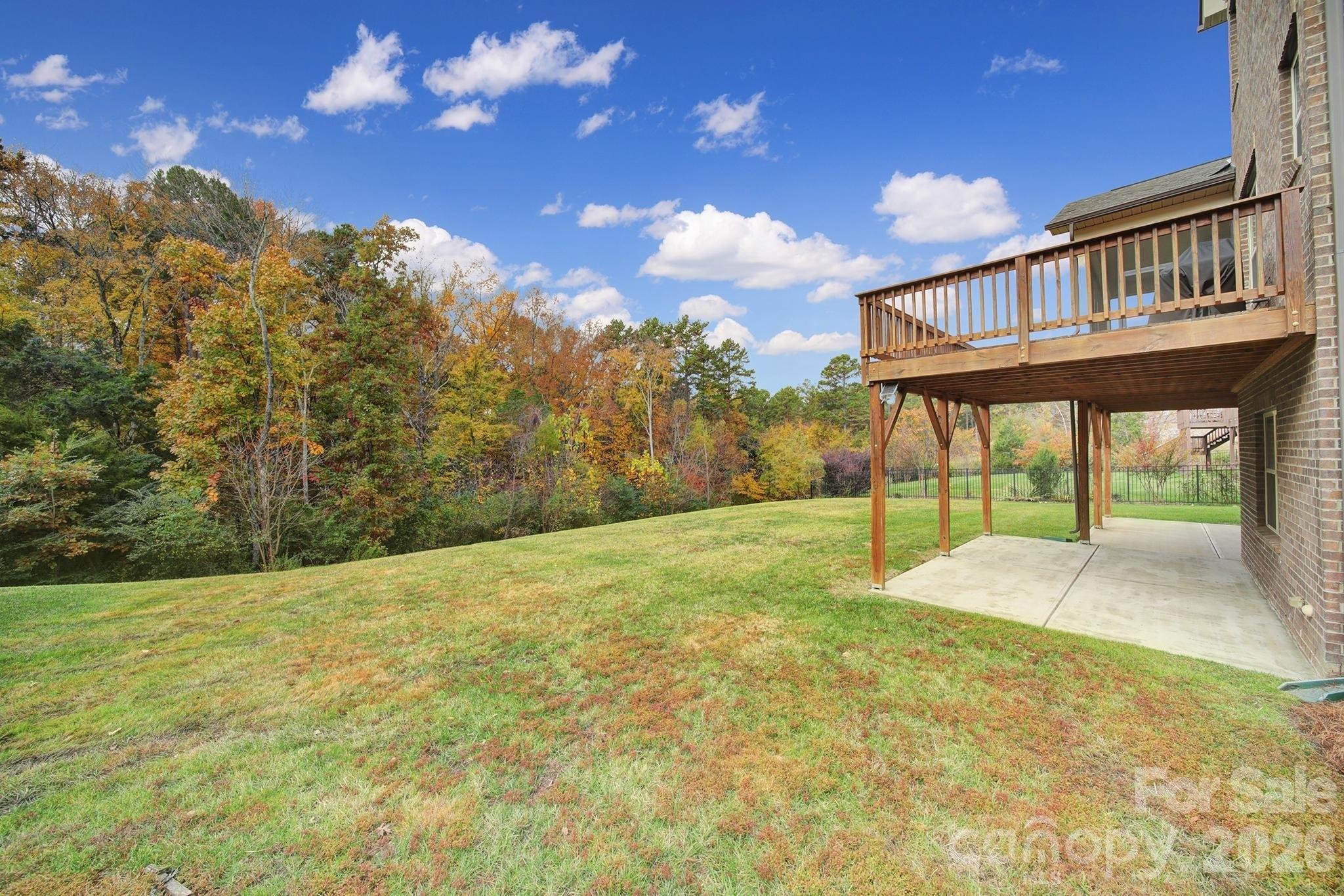 6507 Calvert Commons Drive Huntersville, NC 28078 - Photo 40 of 47 a view of an house with backyard and a tree
