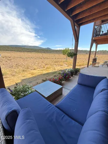 a view of gallery with wooden floor