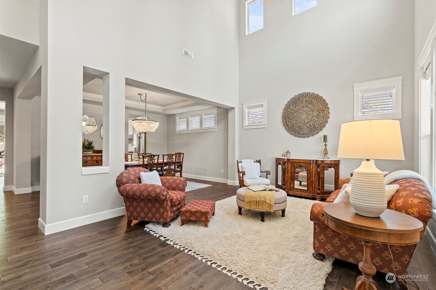 23902 1st Avenue Southeast Bothell, WA 98021 - Photo 2 of 39 a living room with furniture and a window