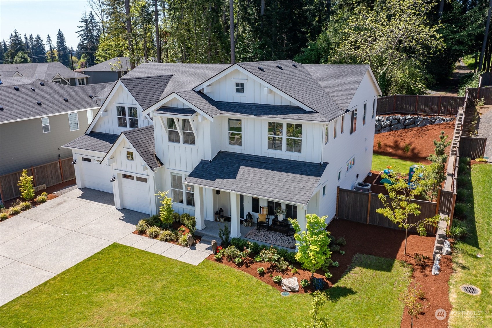 23902 1st Avenue Southeast Bothell, WA 98021 - Photo 31 of 39 a aerial view of a house next to a yard