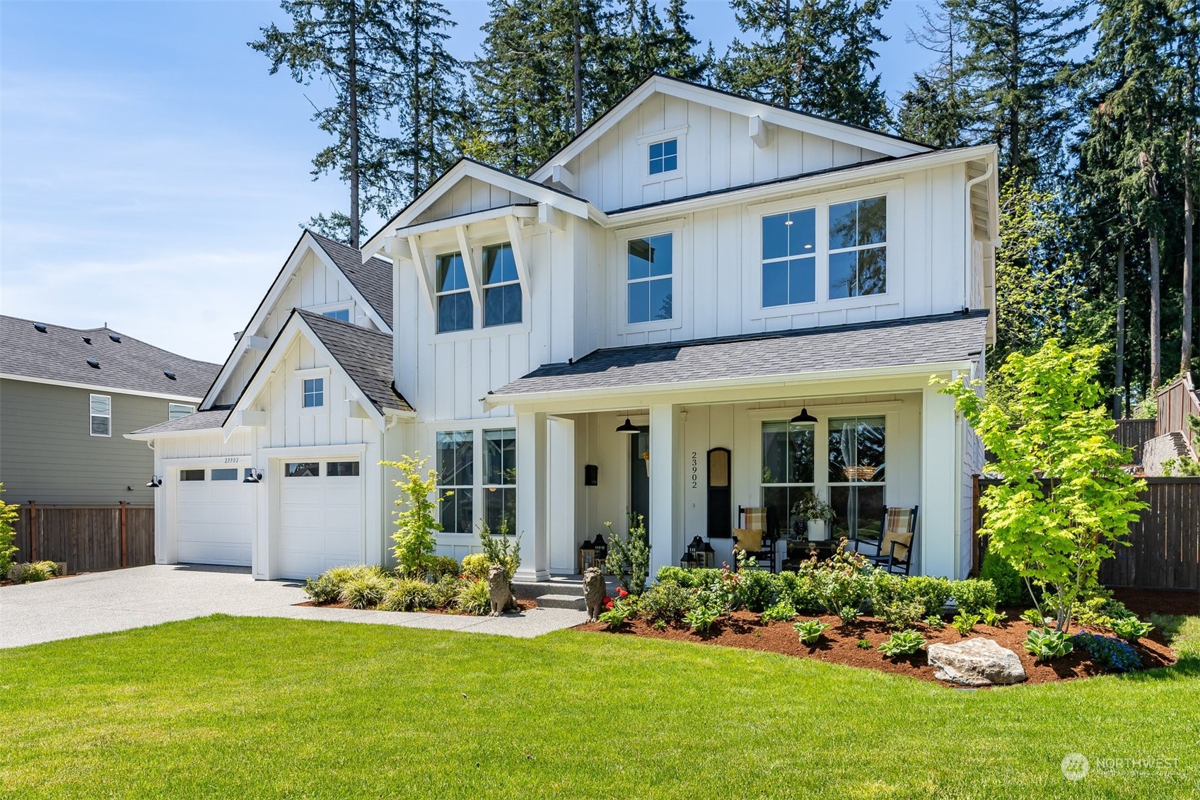 23902 1st Avenue Southeast Bothell, WA 98021 - Photo 33 of 39 a front view of a house with a yard and garage