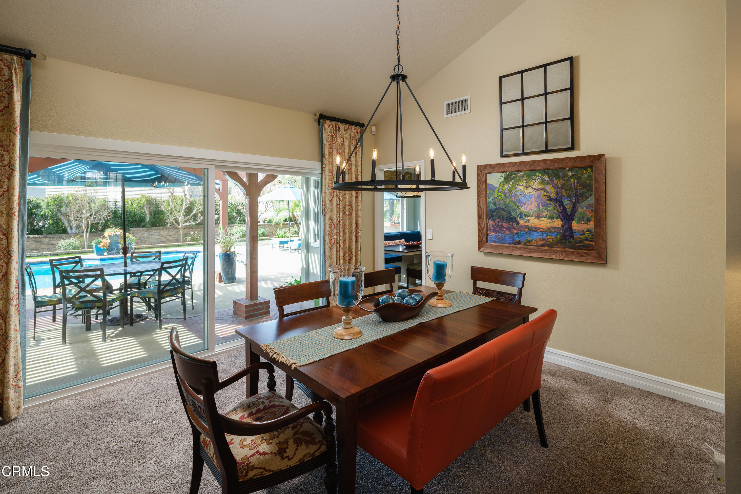 7271 Brydon Road La Verne, CA 91750 - Photo 11 of 63 a dining room with furniture a chandelier and wooden floor