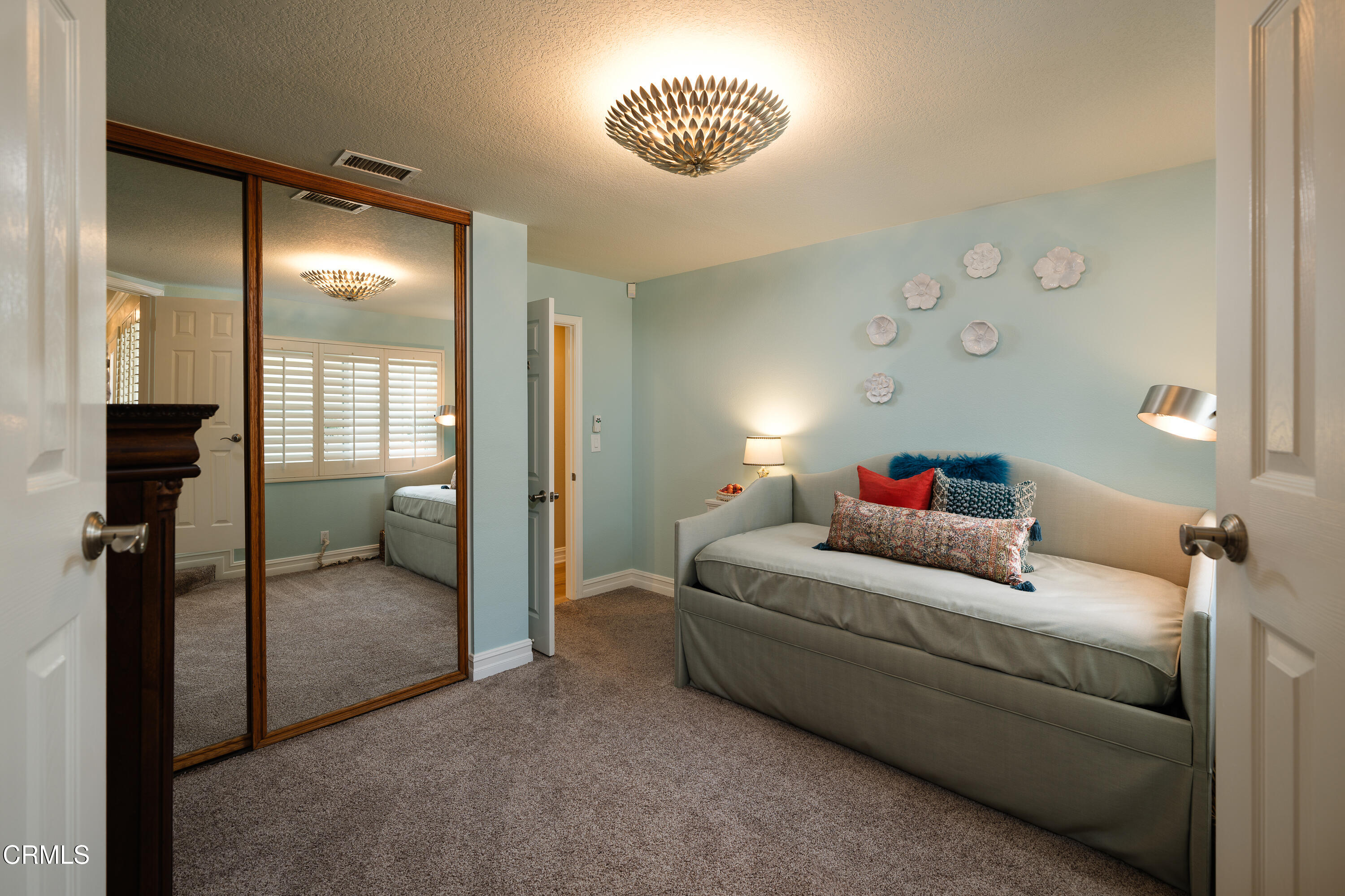 7271 Brydon Road La Verne, CA 91750 - Photo 24 of 63 a bedroom with a bed and a couch