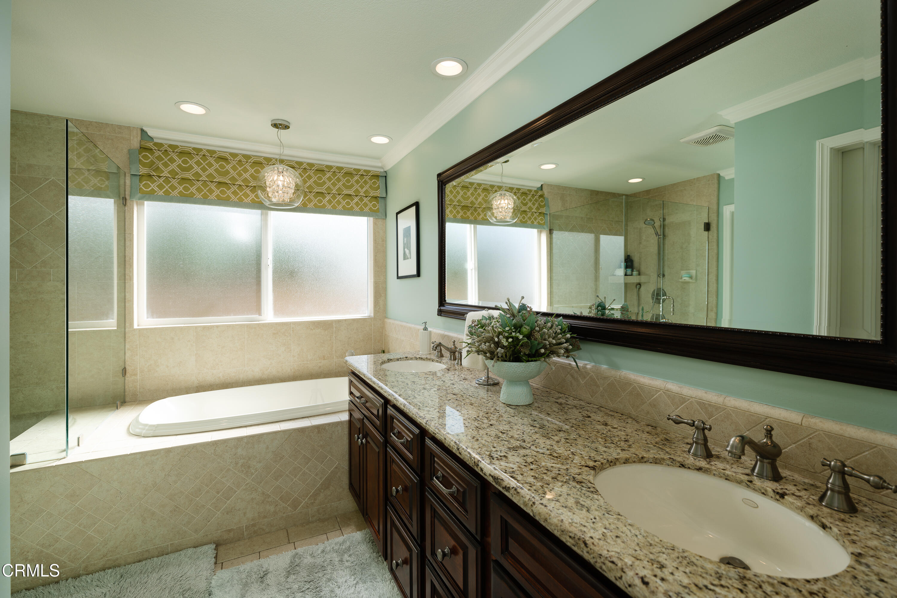 7271 Brydon Road La Verne, CA 91750 - Photo 33 of 63 a bathroom with a granite countertop tub sink and mirror