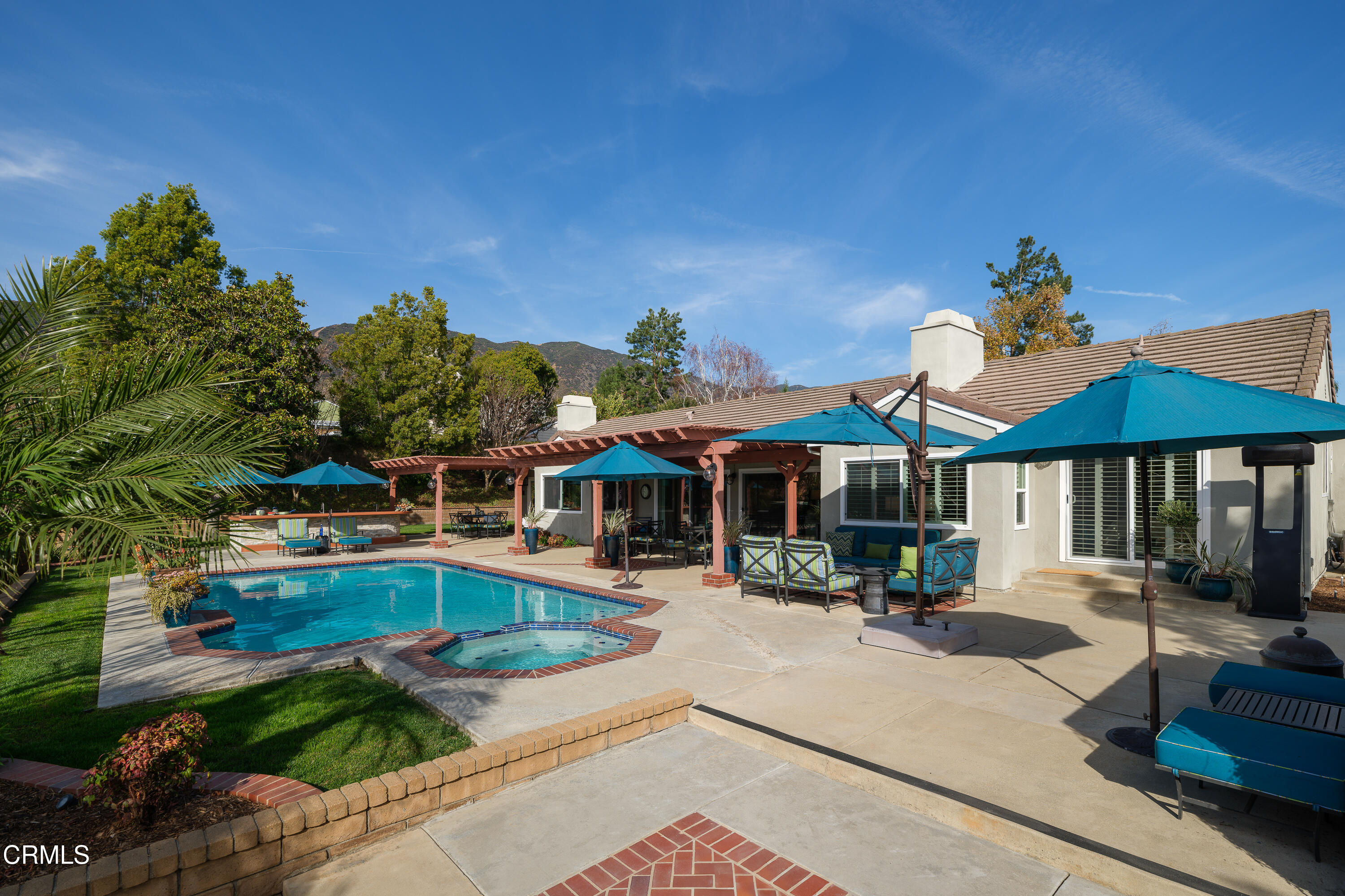 7271 Brydon Road La Verne, CA 91750 - Photo 45 of 63 a swimming pool view with a seating space and a garden view