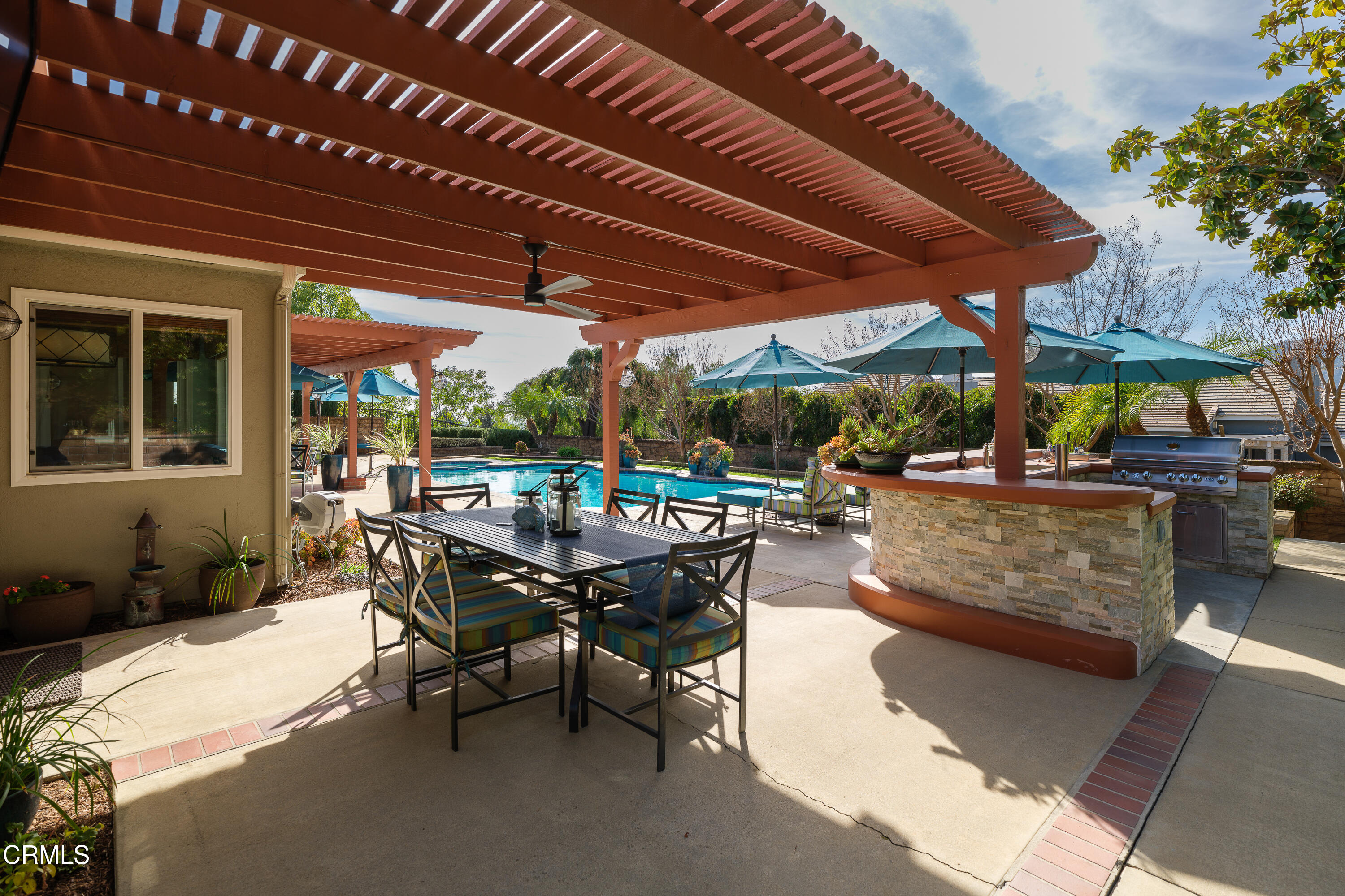 7271 Brydon Road La Verne, CA 91750 - Photo 56 of 63 a patio with a patio table and chairs
