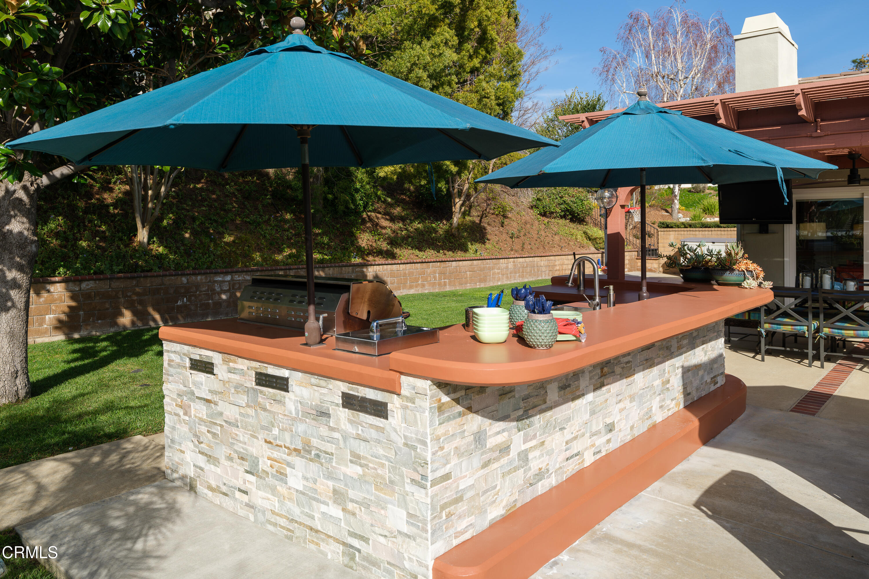7271 Brydon Road La Verne, CA 91750 - Photo 58 of 63 a view of pool with table and chairs under an umbrella