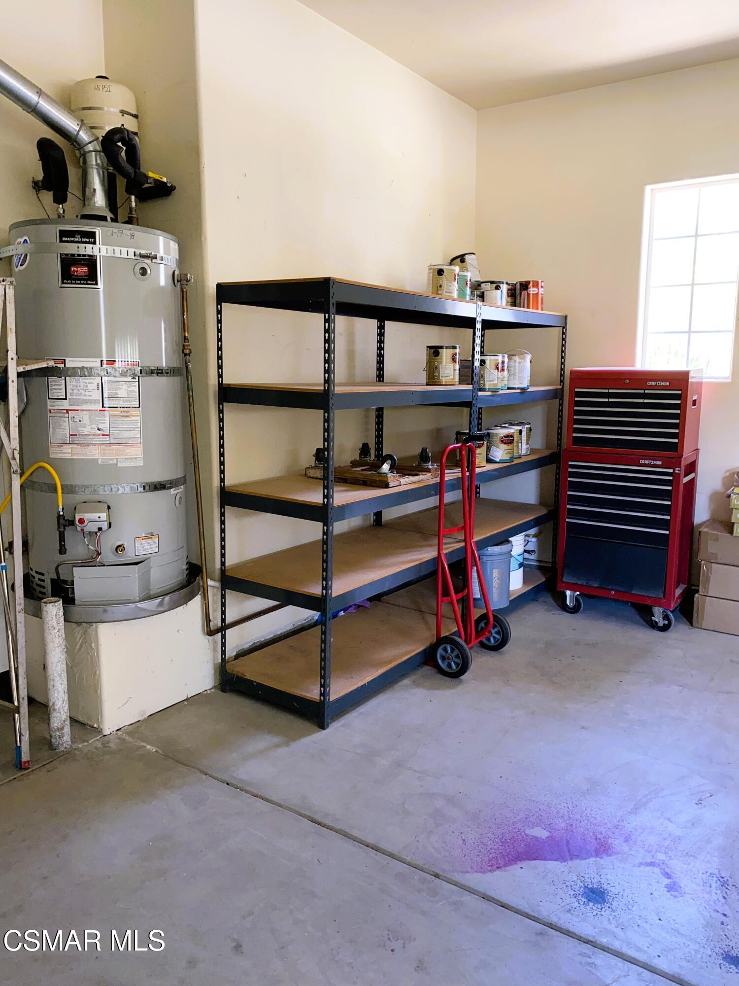4501 Via Rio Newbury Park, CA 91320 - Photo 22 of 24 a bedroom with furniture and a lamp
