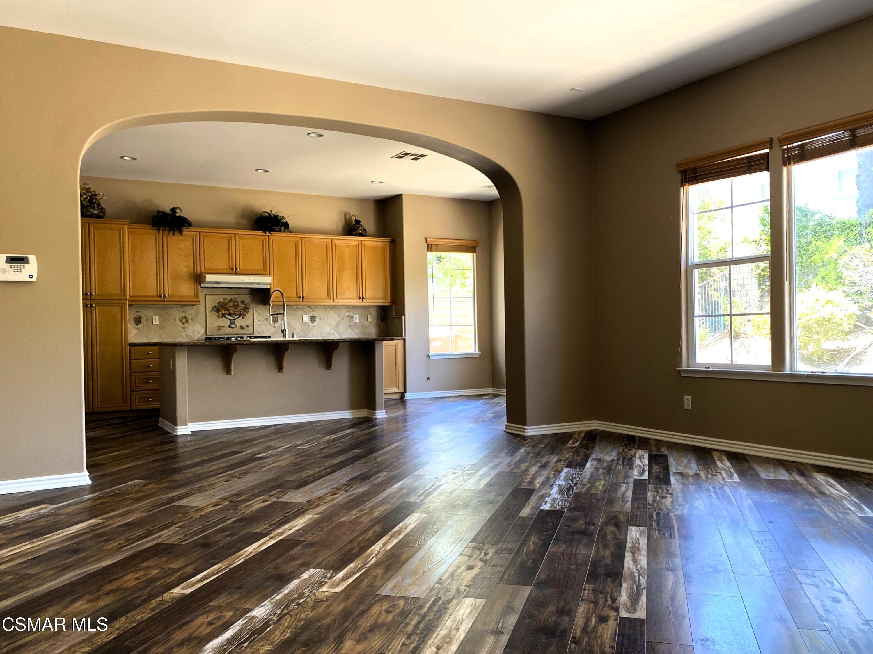 4501 Via Rio Newbury Park, CA 91320 - Photo 7 of 24 a view of kitchen and kitchen with wooden floor