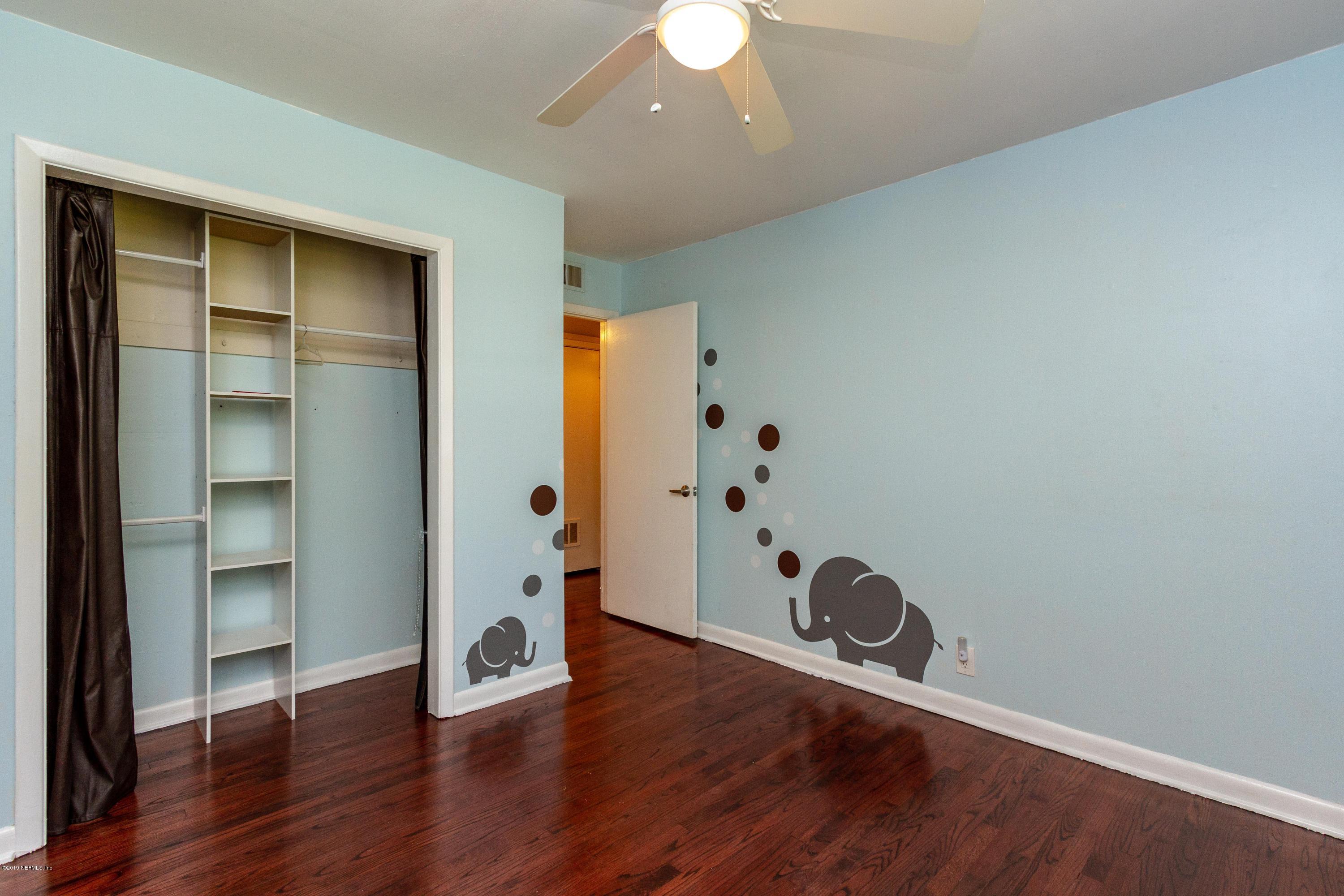 7420 Hennessy Road Jacksonville, FL 32244 - Photo 26 of 39 a view of entryway with wooden floor