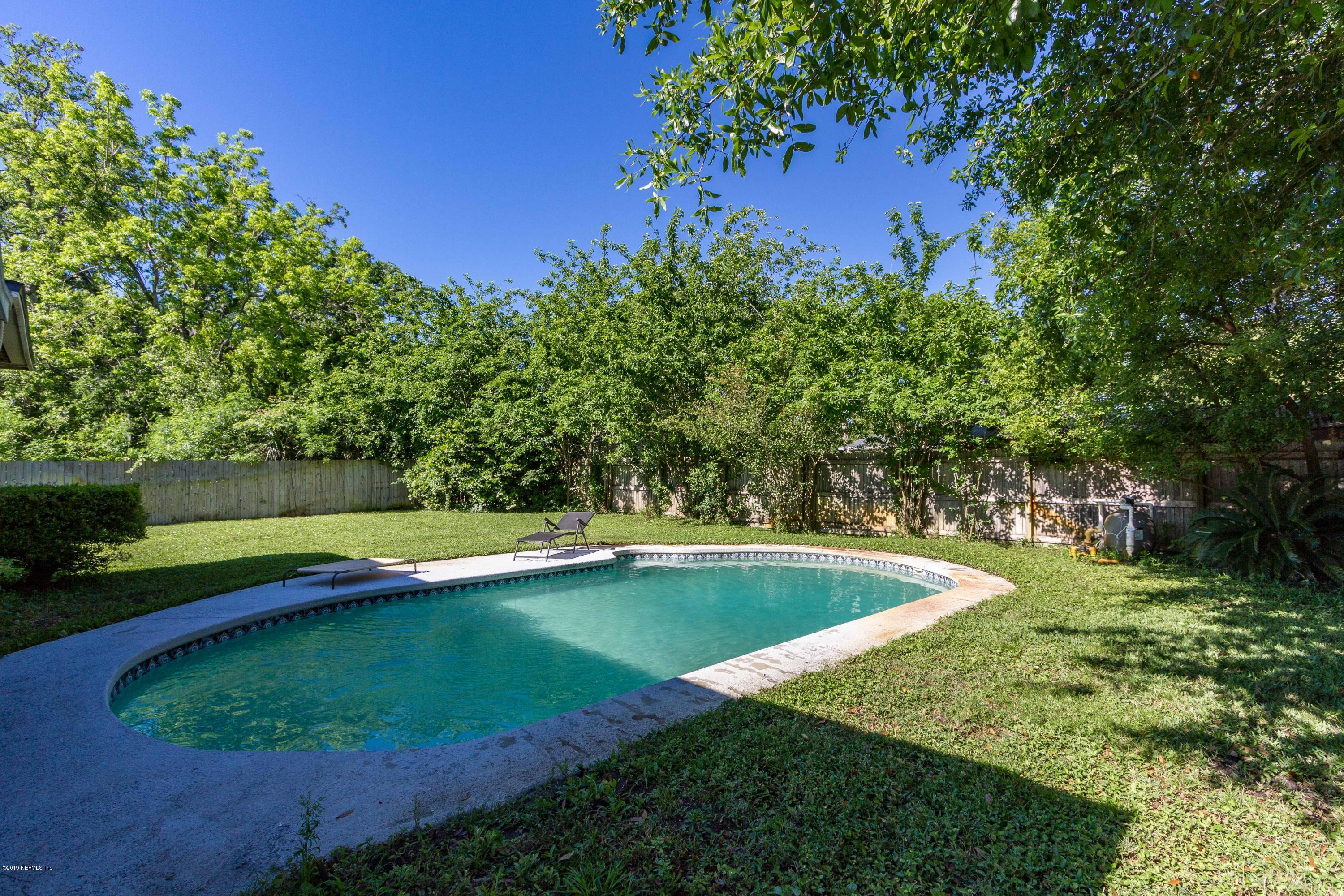 7420 Hennessy Road Jacksonville, FL 32244 - Photo 34 of 39 a view of a backyard with swimming pool