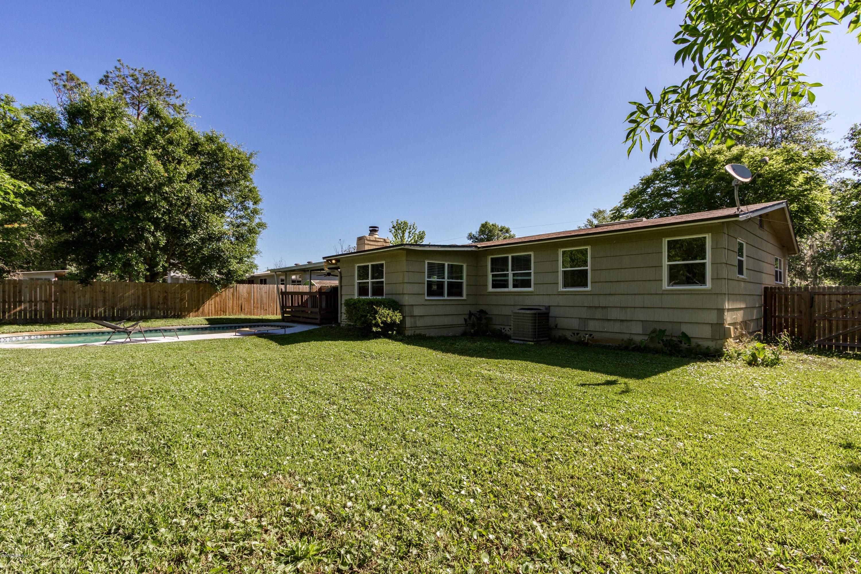 7420 Hennessy Road Jacksonville, FL 32244 - Photo 36 of 39 a front view of a house with a yard