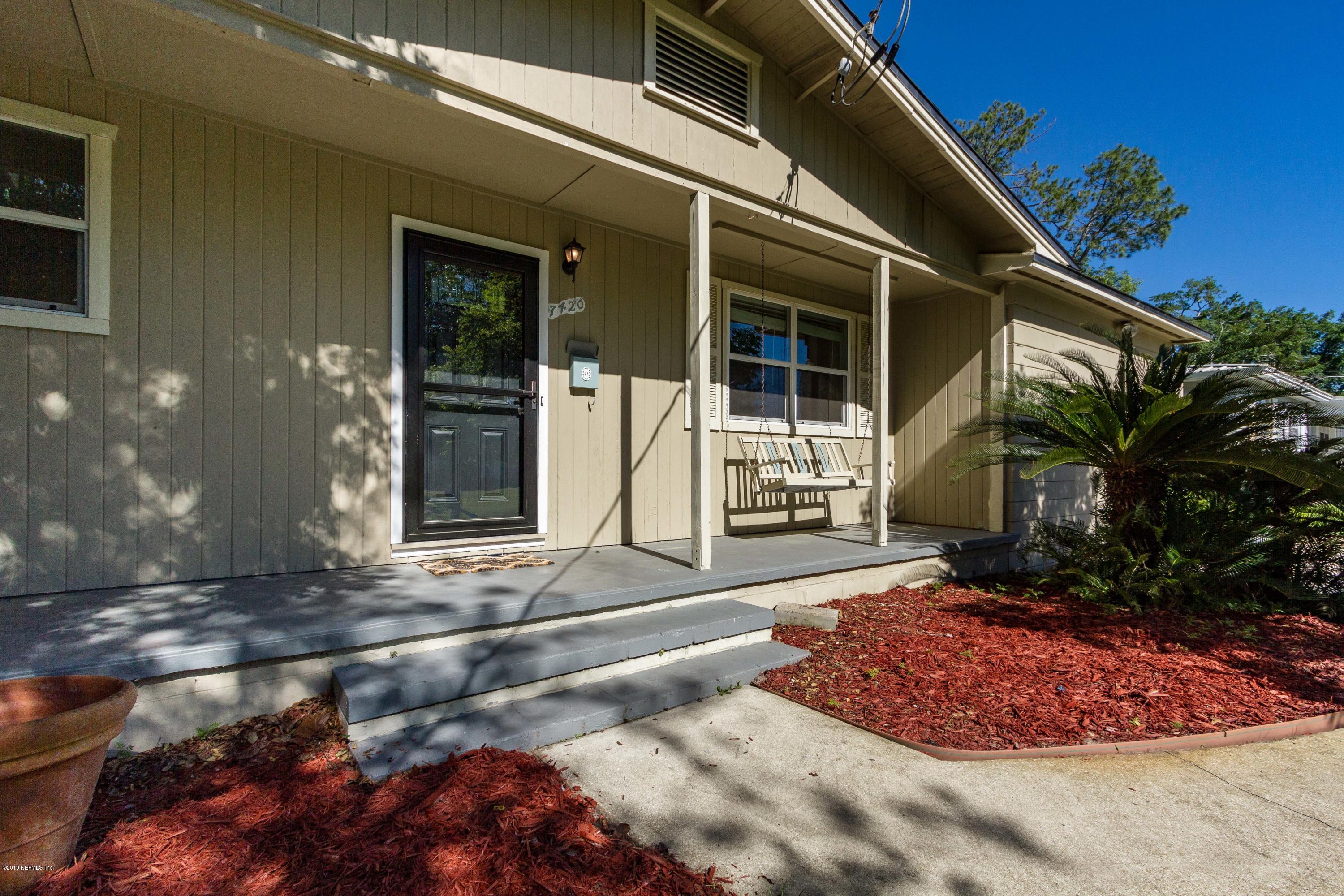 7420 Hennessy Road Jacksonville, FL 32244 - Photo 5 of 39 a front view of a house