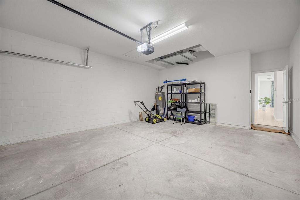 2555 Bending Bonsai Drive Wesley Chapel, FL 33543 - Photo 44 of 59 an empty room with ceiling fan and windows