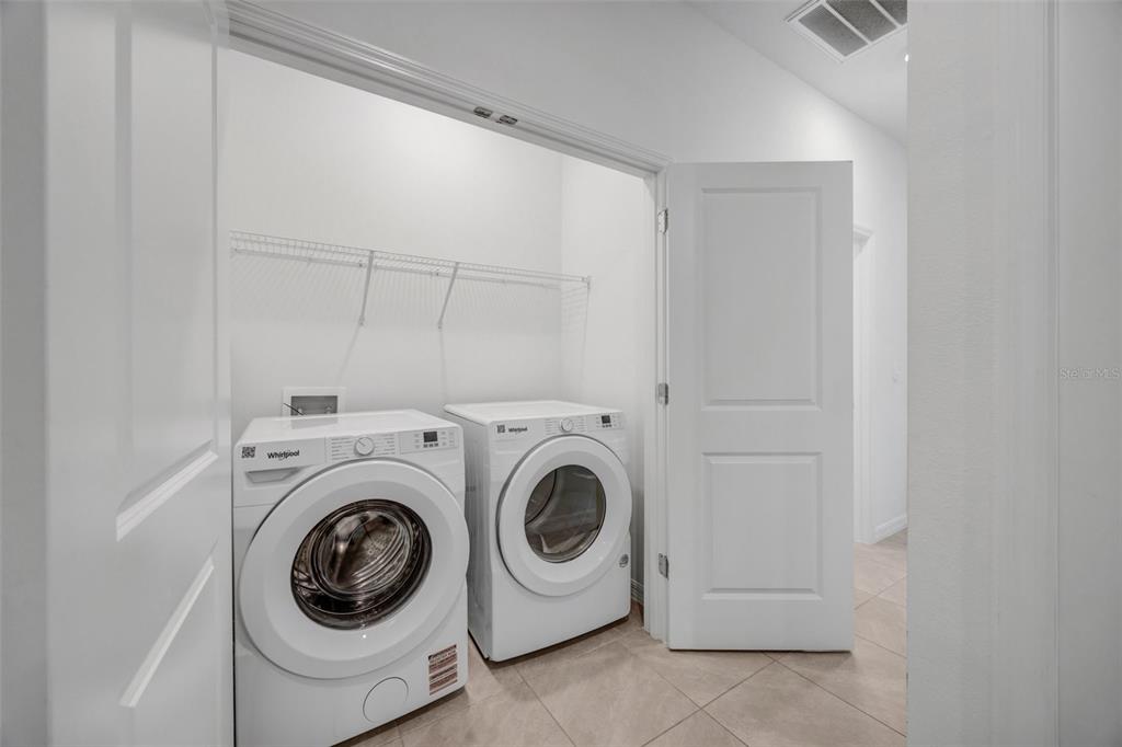 2555 Bending Bonsai Drive Wesley Chapel, FL 33543 - Photo 45 of 59 a utility room with dryer and washer