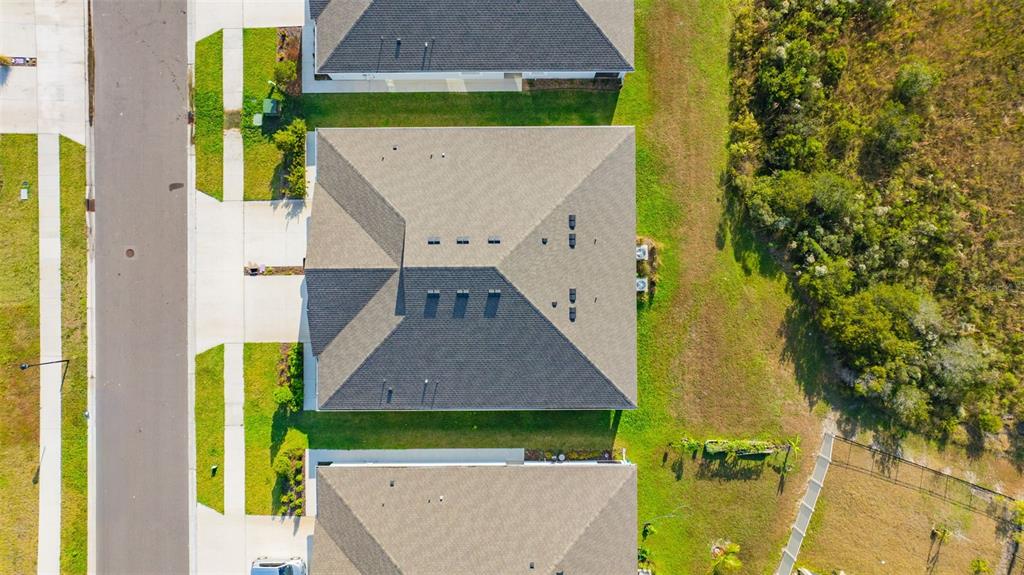 2555 Bending Bonsai Drive Wesley Chapel, FL 33543 - Photo 8 of 59 an aerial view of a house with swimming pool