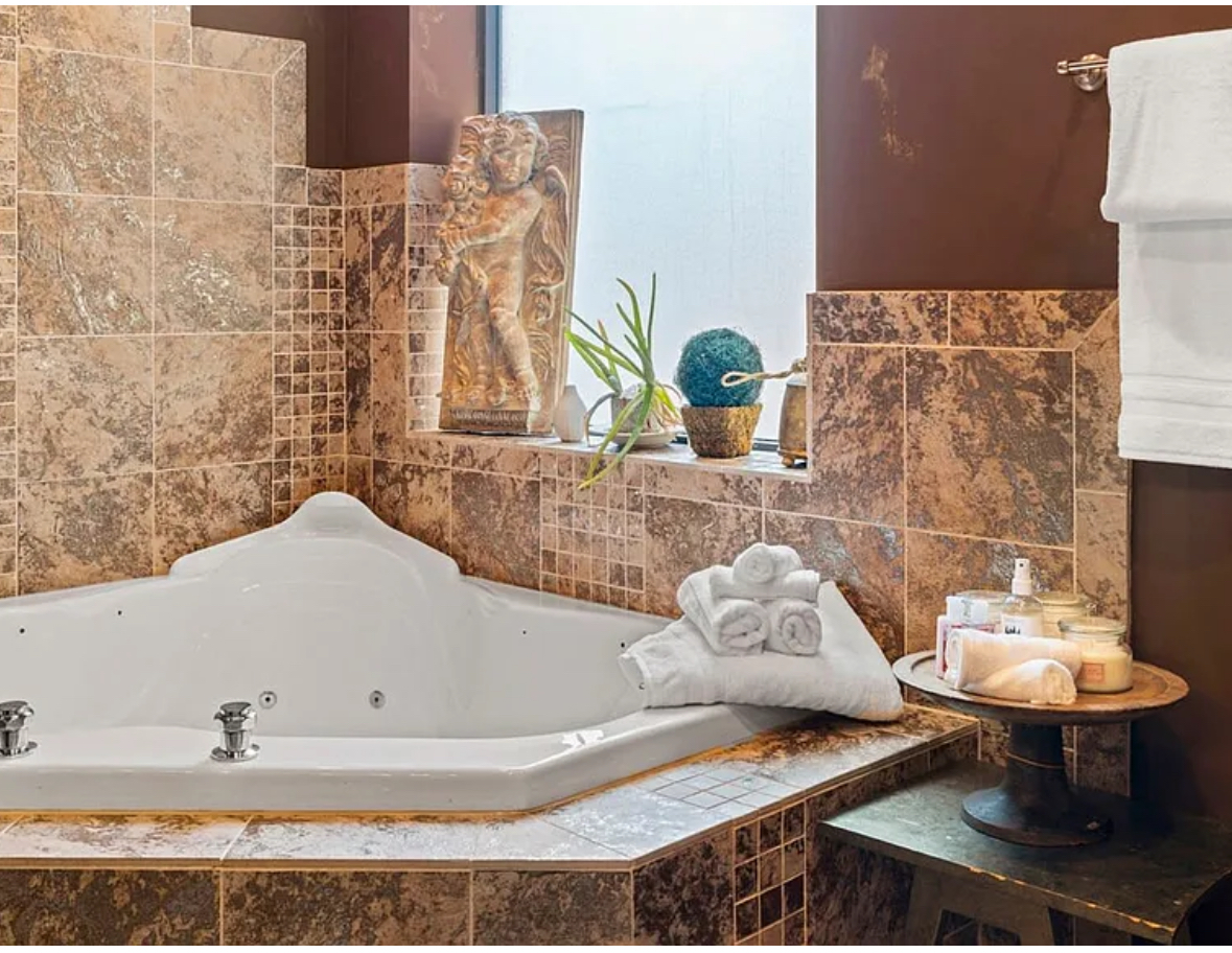 Undisclosed Address Chicago, IL 60608 - Photo 19 of 46 a bathroom with a sink and a mirror