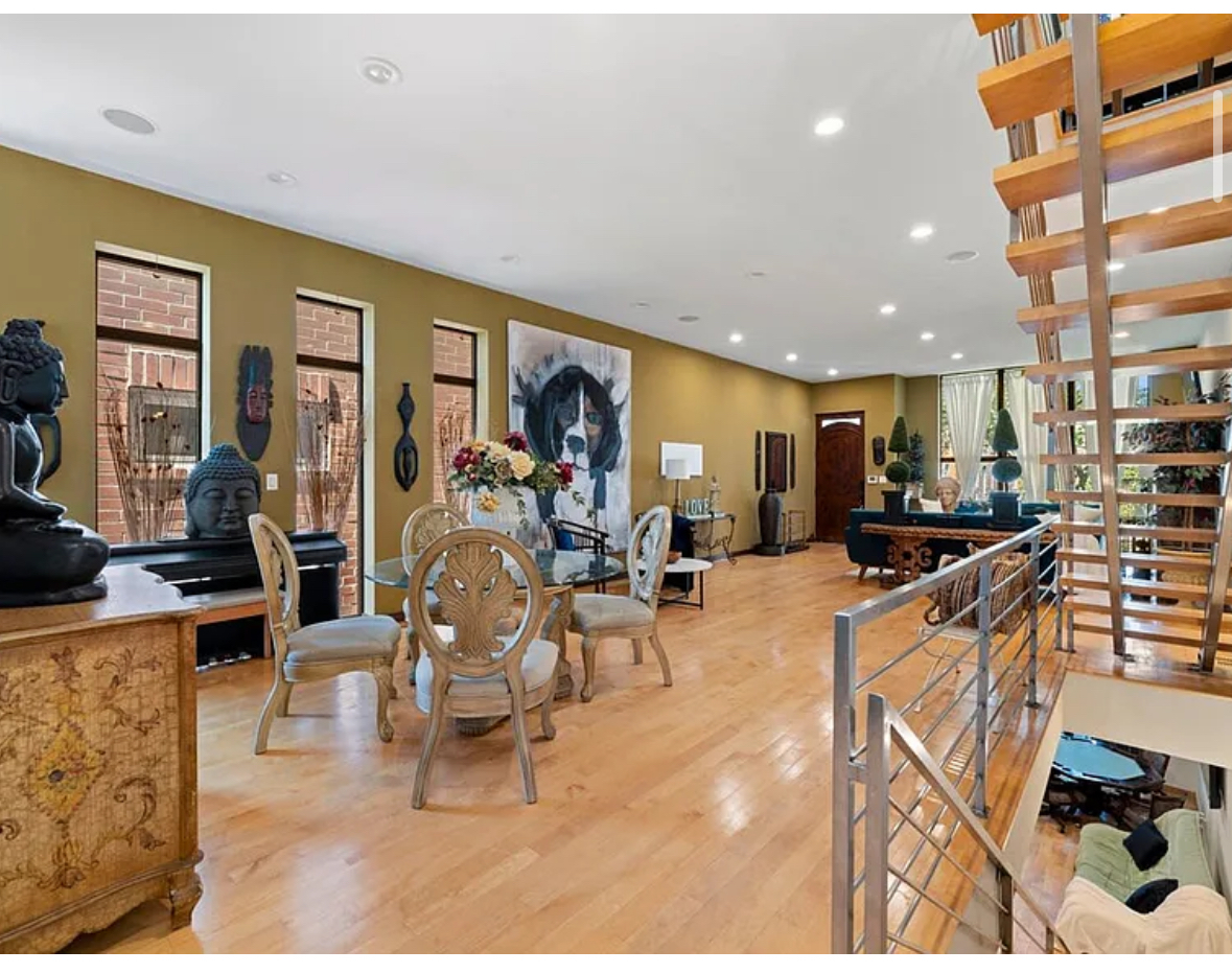 Undisclosed Address Chicago, IL 60608 - Photo 4 of 46 a living room with furniture a large window and kitchen view