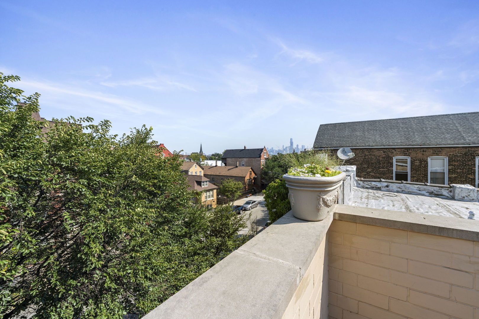 Undisclosed Address Chicago, IL 60608 - Photo 44 of 46 a view of a terrace with furniture and a garden
